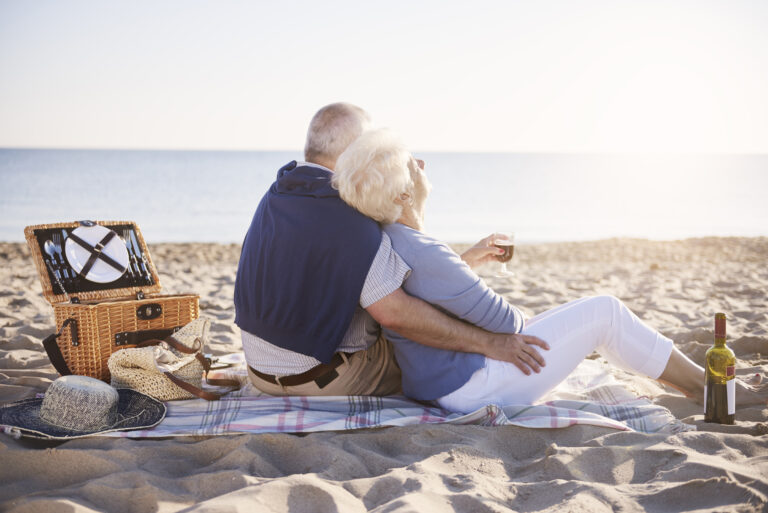 senior marriage having good morning beach