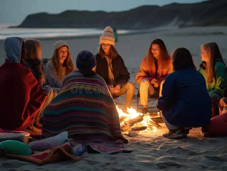 vibrant glow bonfire illuminates night as diverse group gen zers huddle together sandy beach colorful blankets adorn 281555871.jpg